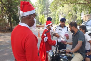 Goa police spreading awareness about traffic rules and regulation by wearing Santa outfit