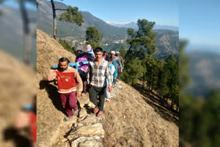 woman-and-newborn-brought-to-the-home-on-shoulder-at-berinag