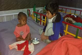 the-seven-girl-child-is-taking-care-of-her-younger-malnourished-sister-khagone