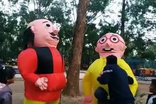 People have fun with cartoon characters Motu-Patlu