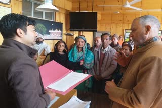 memorandum to DC Kangra against illegal mining