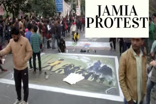 Jamia students, artists paint roads outside university in protest against CAA, NRC