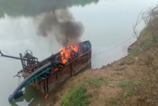 Poklen machine seized and set on fire