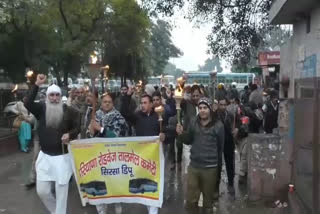 Haryana Roadways employees took out a torch procession in Sirsa