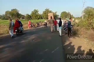 wheat-filled-truck-hit-the-motorcycle-harda