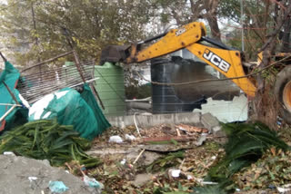 Noida authority action on builder who capture green belt area