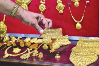 Gold slides by Rs 80, silver falls Rs 200