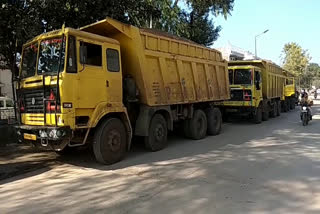 trucks carrying sand seized