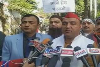 Samajwadi Party activists protesting against the attack on Nankana Sahib Gurdwara in Pakistan