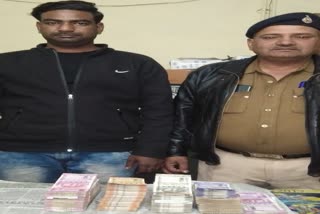 Youth caught with money