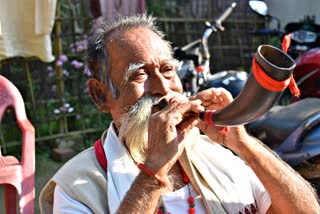 80 years old artist playing assamese traditional horn, beating drum yet now