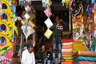 Shops adorned with colorful kites in the markets of Gwalior