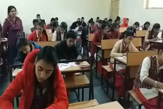 Examination of students on holiday