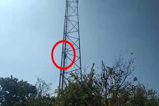 man climbed 100 meter high tower