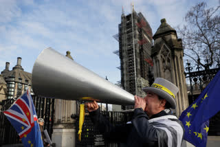 UK plans Brexit celebrations but warns businesses may suffer