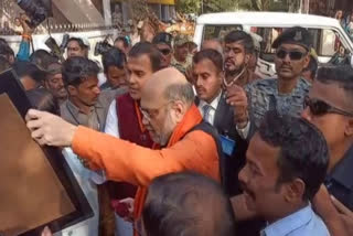 Amit Shah meets party workers at Union Minister Pralhad Joshi residence in Hubbali