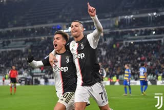 Ronaldo double leads Juventus to 2-1 win over Parma to stay top of Serie A