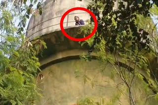 Students climbed on a water tank