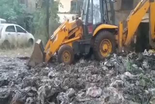 JCB machine on liquor