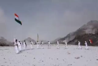 Indo-Tibetan Border Police personnel with the national flag celebrating Republic Day