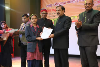 Scholarship certificate distributed by MP Mahesh Sharma