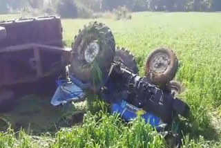 tractor overturns