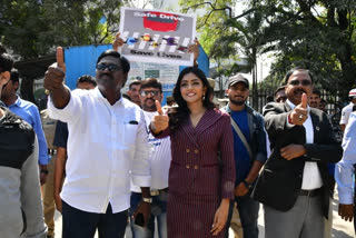 MINISTER AJAY KUMAR AND CINE ACTOR ESHA REBBA IN ROAD SAFETY VAAROTHSAVAALU