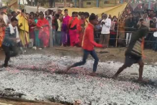 Devotees walk on burning coal