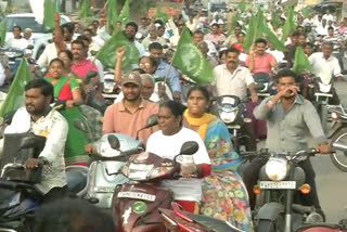 farmers and womens participated in a bike rally conducted in amaravati