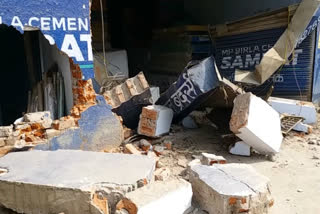 Shop collapsed due to collision with tractor