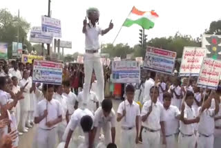 Students flash mob on road safety at godavarikhani