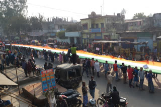 flag march against caa