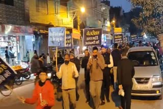 aam aadmi party  takes out silent marches against bjp leader parvesh verma