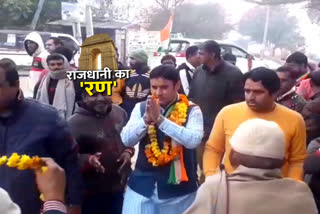 Congress candidate Siddharth Kundu arrives to march in Narela in Delhi Election 2020