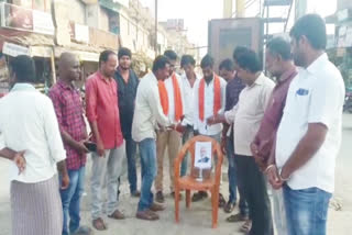 Budget is a hoax at karimnagar bjp leader modi photos milk at siddipet