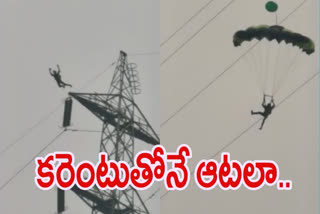 a foreigner jumped from 200 feet high hi tension tower in varanasi