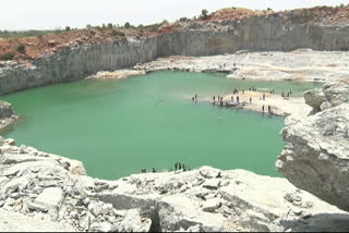 People come to swim in quarry at kolar