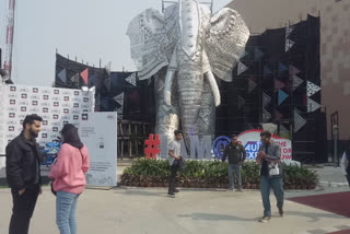 Selfie point and silver elephant attracting people at Auto Expo 2020 Greater Noida