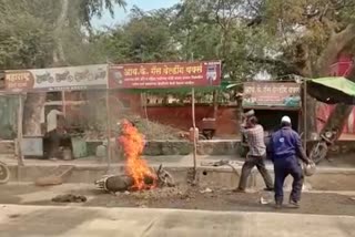 two wheelar burning