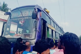 Bus catches fire after coming in contact with an overhead power transmission line