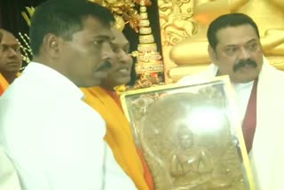 Sri Lanka Prime Minister Mahinda Rajapaksa offers prayers at Sarnath Buddhist temple