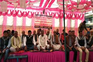 BJP leader sitting on dharna