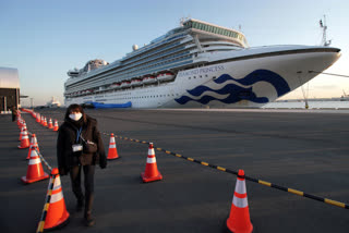 The quarantined cruise ship Diamond Princess anchors at the Yokohama Port,