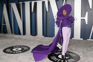 Billy Porter sets Oscar after-party on fire with flowy purple outfit