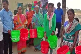 Distribution of trash buckets  to the village at kagawada