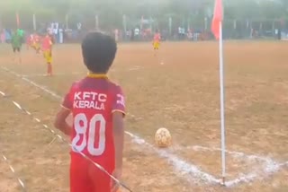 10 year old zero degree corner kick boy focused on10 year old zero degree corner kick boy focused on football only football only