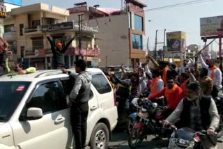 rally with bare swords and sticks in Rourkei