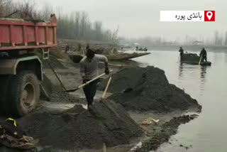 Bandipora: Labourers In bandipora Stage Protest Against ban on sand extraction