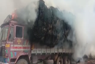 Grass lorrey fire due to electrict shock at gudivada in krishna