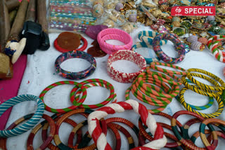 Womens buying Lac bangles in bharat rang mahotsav 2020 at delhi